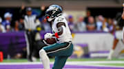 Oct 19, 2025; Minneapolis, Minnesota, USA; Philadelphia Eagles wide receiver A.J. Brown (11) celebrates a touchdown during the second half against the Minnesota Vikings at U.S. Bank Stadium. 