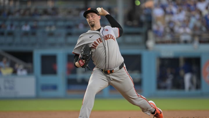 Jul 22, 2024; Los Angeles, California, USA;  San Francisco Giants starting pitcher Blake Snell (7) delivers to the plate in the second inning against the Los Angeles Dodgers at Dodger Stadium. Mandatory Credit: Jayne Kamin-Oncea-USA TODAY Sports