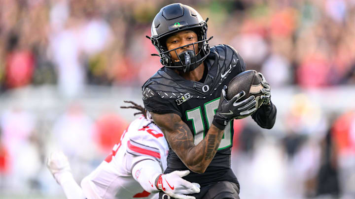 Oct 12, 2024; Eugene, Oregon, USA; Oregon Ducks wide receiver Tez Johnson (15) makes a catch for a touchdown during the second quarter against the Ohio State Buckeyes at Autzen Stadium. Mandatory Credit: Craig Strobeck-Imagn Images