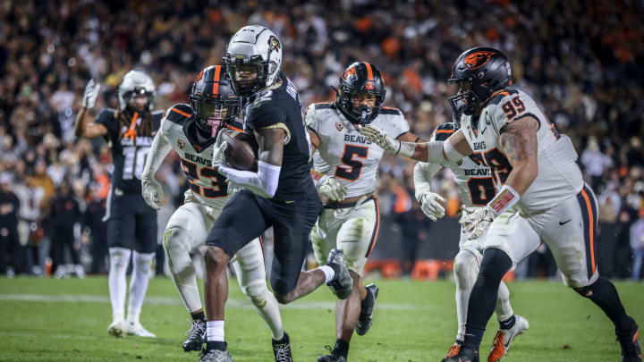 Nov 4, 2023; Boulder, Colorado, USA; Colorado Buffaloes cornerback Travis Hunter (12) breaks past Oregon State Beavers defensive back Jermod McCoy (23) at Folsom Field. Mandatory Credit: Chet Strange-USA TODAY Sports