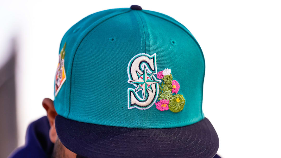Feb 12, 2026; Phoenix, AZ, USA; A detailed view of Spring Training Hat at Seattle Mariners workouts in Peoria, Arizona. Mandatory Credit: Arianna Grainey-Imagn Images