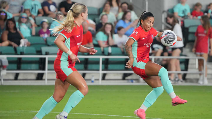 Jul 27, 2024; Kansas City, Missouri, USA; Kansas City Current midfielder Debinha (99) play the ball in the second half against Pachuca at CPKC Stadium. Mandatory Credit: Denny Medley-USA TODAY Sports