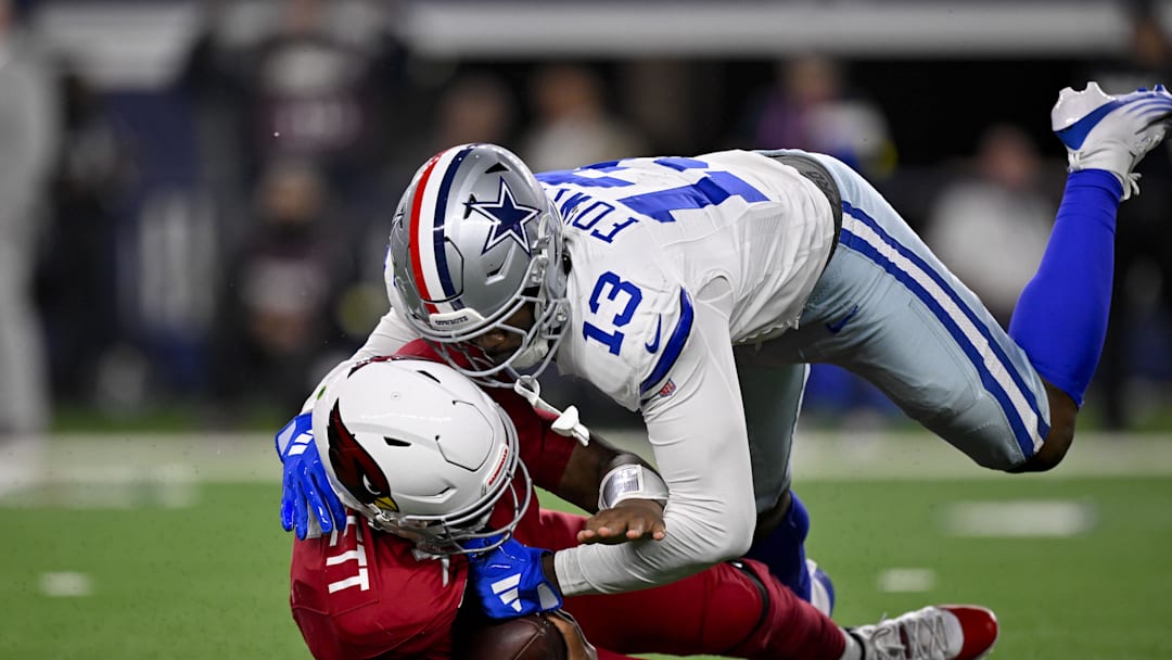 Nov 3, 2025; Arlington, Texas, USA; Dallas Cowboys defensive end Dante Fowler Jr. (13) sacks Arizona Cardinals quarterback Jacoby Brissett (7) during the game between the Dallas Cowboys and the Arizona Cardinals at AT&T Stadium. Mandatory Credit: Jerome Miron-Imagn Images