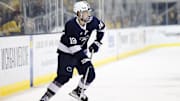 Penn State forward Aiden Fink skates with the puck in overtime  against the Michigan Wolverines during a Big Ten Tournament quarter final game at Yost Arena. 