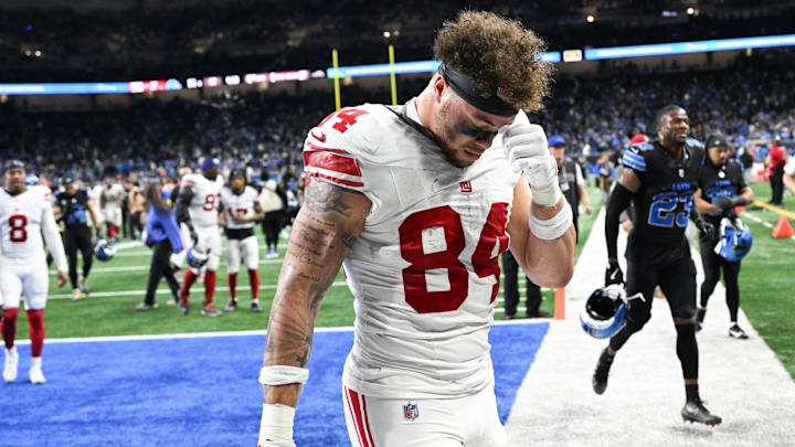 Nov 23, 2025; Detroit, Michigan, USA; New York Giants tight end Theo Johnson (84) walks the field after the game against the Detroit Lions at Ford Field. Nov 23, 2025; Detroit, Michigan, USA; New York Giants tight end Theo Johnson (84) walks the field after the game against the Detroit Lions at Ford Field.