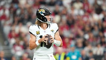 Nov 23, 2025; Glendale, Arizona, USA;  Jacksonville Jaguars quarterback Trevor Lawrence (16) looks to pass during the first quarter against the Arizona Cardinals at State Farm Stadium. Mandatory Credit: Joe Camporeale-Imagn Images