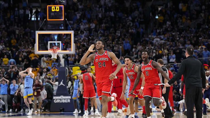 Mar 8, 2025; Milwaukee, Wisconsin, USA;  St. John’s basketball forward Zuby Ejiofor (24) celebrates after making the game winning shot in overtime against the Marquette Golden Eagles at Fiserv Forum.