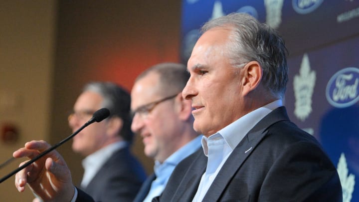 May 21, 2024; Toronto, Ontario, CANADA; Toronto Maple Leafs new head coach Craig Berube speaks during an introductory media conference while seated beside general manager Brad Treliving (center) and team president Brendan Shanahan at Ford Performance Centre. Mandatory Credit: Dan Hamilton-USA TODAY Sports