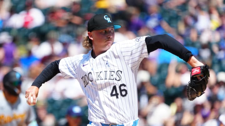 Jun 16, 2024; Denver, Colorado, USA; Colorado Rockies pitcher Nick Mears (46) delivers a pitch in the seventh inning against the Pittsburgh Pirates at Coors Field. Mandatory Credit: Ron Chenoy-USA TODAY Sports