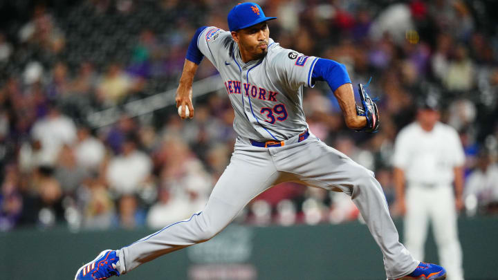 Aug 7, 2024; Denver, Colorado, USA; New York Mets relief pitcher Edwin Diaz (39) delivers a pitch in the ninth inning against the Colorado Rockies at Coors Field. Mandatory Credit: Ron Chenoy-USA TODAY Sports