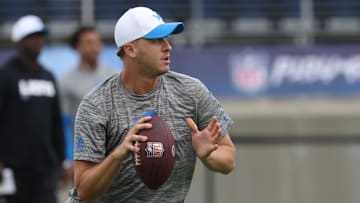 Jul 31, 2025; Canton, Ohio, USA;  Detroit Lions quarterback Jared Goff (16) warms up before the game against the Los Angeles Chargers at Tom Benson Hall of Fame Stadium. Mandatory Credit: Charles LeClaire-Imagn Images