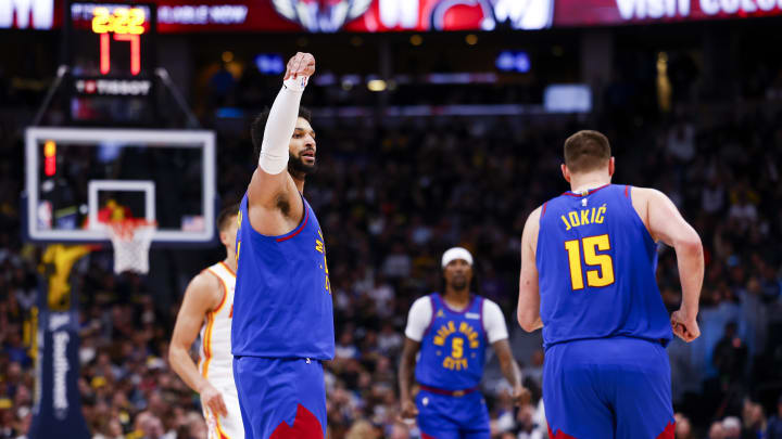 Apr 6, 2024; Denver, Colorado, USA; Denver Nuggets guard Jamal Murray (27) celebrates after making a three-point shot against the Atlanta Hawks in the first half at Ball Arena. Mandatory Credit: Michael Ciaglo-USA TODAY Sports