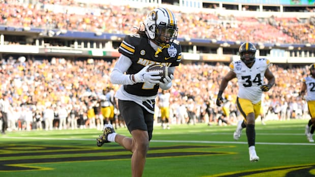 Missouri Tigers wide receiver Marquis Johnson (2) makes a catch for a touchdown