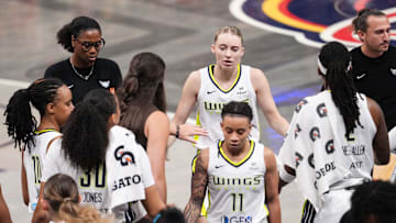 Dallas Wings guard Paige Bueckers (5) walks off the court during a timeout on Sunday, July 13, 2025, during the game at Gainbridge Fieldhouse in Indianapolis.