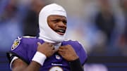 Dec 7, 2025; Baltimore, Maryland, USA; Baltimore Ravens quarterback Lamar Jackson (8) looks on during warmups before the game between the Pittsburgh Steelers and Baltimore Ravens at M&T Bank Stadium. Mandatory Credit: Peter Casey-Imagn Images