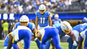Aug 16, 2025; Inglewood, California, USA; Los Angeles Chargers place kicker Cameron Dicker (11) prepares to kick the ball against the Los Angeles Chargers during the first quarter at SoFi Stadium. Mandatory Credit: Jonathan Hui-Imagn Images