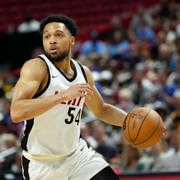 Jul 22, 2024; Las Vegas, NV, USA; Miami Heat guard Caleb Daniels (54) dribbles the ball against the Memphis Grizzlies during the first half at Thomas & Mack Center. Mandatory Credit: Lucas Peltier-Imagn Images