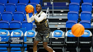Mar 19, 2025; Lexington, KY, USA; Wofford Terriers guard Justin Bailey (5) shoots the ball during practice at Rupp Arena. Mandatory Credit: Jordan Prather-Imagn Images