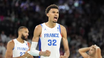 Aug 6, 2024; Paris, France; France power forward Victor Wembanyama (32) celebrates after defeating Canada in a men’s basketball quarterfinal game during the Paris 2024 Olympic Summer Games at Accor Arena. Mandatory Credit: Kyle Terada-USA TODAY Sports