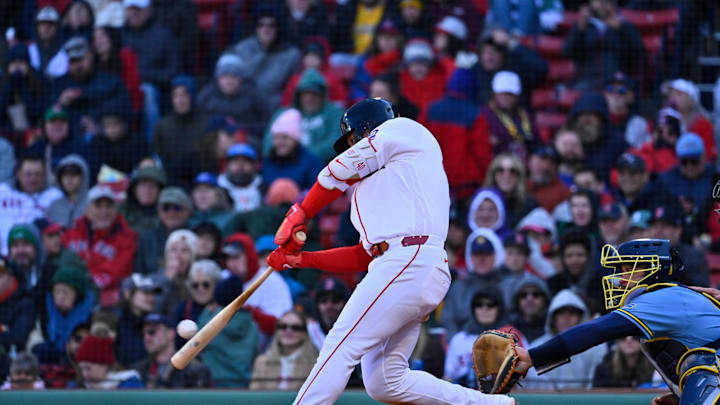Apr 8, 2026; Boston, Massachusetts, USA; Boston Red Sox first baseman Willson Contreras (40) hits a single against the Milwaukee Brewers during the seventh inning at Fenway Park. Mandatory Credit: Eric Canha-Imagn Images