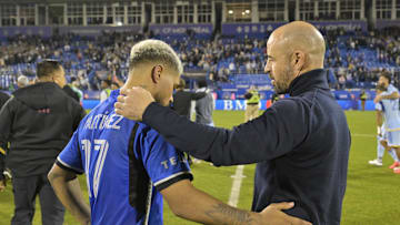 Oct 22, 2024; Montreal, Quebec, CAN; CF Montreal head coach Laurent Courtois talks with CF Montreal forward Josef Martinez (17) after being defeated by the Atlanta United at Stade Saputo. Mandatory Credit: Eric Bolte-Imagn Images