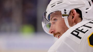Jan 17, 2025; Buffalo, New York, USA;  Pittsburgh Penguins defenseman Marcus Pettersson (28) waits for the face-off during the second period against the Buffalo Sabres at KeyBank Center. Mandatory Credit: Timothy T. Ludwig-Imagn Images