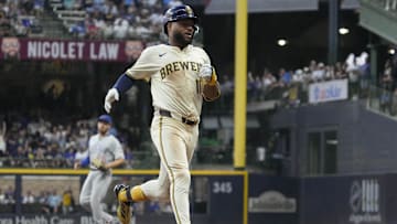 Jul 29, 2025; Milwaukee, Wisconsin, USA; Milwaukee Brewers outfielder Jackson Chourio (11) hits a triple against the Chicago Cubs in the fifth inning at American Family Field. Mandatory Credit: Michael McLoone-Imagn Images