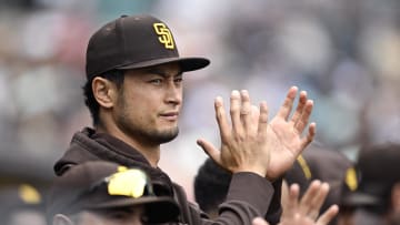 May 15, 2024; San Diego, California, USA; San Diego Padres starting pitcher Yu Darvish (11) applauds in the dugout during the seventh inning against the Colorado Rockies at Petco Park. Mandatory Credit: Orlando Ramirez-USA TODAY Sports