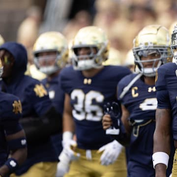 Notre Dame corner back Benjamin Morrison (20) walks with his team during warm ups before a NCAA college football game between Notre Dame and Northern Illinois at Notre Dame Stadium on Saturday, Sept. 7, 2024, in South Bend.