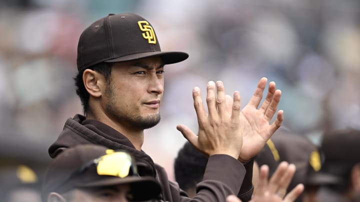 May 15, 2024; San Diego, California, USA; San Diego Padres starting pitcher Yu Darvish (11) applauds in the dugout during the seventh inning against the Colorado Rockies at Petco Park. Mandatory Credit: Orlando Ramirez-USA TODAY Sports