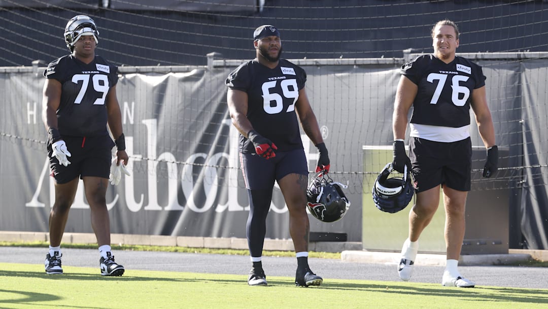 Houston Texans offensive tackle Aireontae Ersery (79) and guard Ed Ingram (69) and tackle Austin Deculus (76) during training camp at Houston Methodist Training Center.