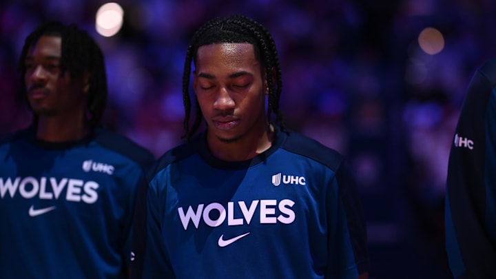 Apr 5, 2025; Timberwolves guard Rob Dillingham observes the national anthem at Wells Fargo Center. Credit: Kyle Ross-Imagn Images