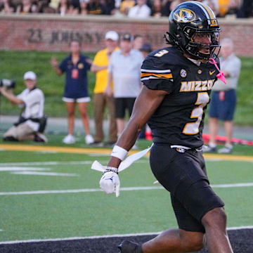 Aug 29, 2024; Columbia, Missouri, USA; Missouri Tigers wide receiver Luther Burden III (3) celebrates after scoring against the Murray State Racers during the first half at Faurot Field at Memorial Stadium. Mandatory Credit: Denny Medley-Imagn Images