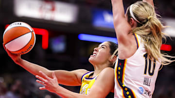 Jun 26, 2025; Indianapolis, Indiana, USA; Los Angeles Sparks guard Kelsey Plum (10) goes up for a basket against Indiana Fever guard Lexie Hull (10) in the first half at Gainbridge Fieldhouse. Mandatory Credit: Grace Smith/INDIANAPOLIS STAR-Imagn Images