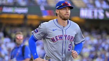 Oct 13, 2024; Los Angeles, California, USA; New York Mets outfielder Brandon Nimmo (9) takes the field before game one of the NLCS for the 2024 MLB Playoffs at Dodger Stadium. Mandatory Credit: Jayne Kamin-Oncea-Imagn Images