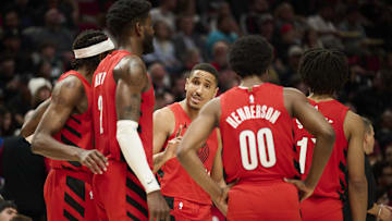 Oct 27, 2023; Portland, Oregon, USA; Portland Trail Blazers guard Malcolm Brogdon (11) talks to his teammates during a time out during the second half against the Orlando Magic at Moda Center. Mandatory Credit: Troy Wayrynen-USA TODAY Sports