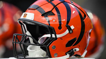 Oct 12, 2025; Green Bay, Wisconsin, USA;  General view of Cincinnati Bengals helmets on the sidelines prior to the game against the Green Bay Packers at Lambeau Field. Mandatory Credit: Jeff Hanisch-Imagn Images