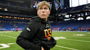 Mar 1, 2025; Indianapolis, IN, USA; Mississippi quarterback Jaxson Dart (QB03) during the 2025 NFL Combine at Lucas Oil Stadium. Mandatory Credit: Kirby Lee-Imagn Images