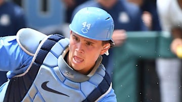 North Carolina catcher Luke Stevenson goes for a tag during an NCAA Super Regional game against Arizona on June 7 at Boshamer Stadium.