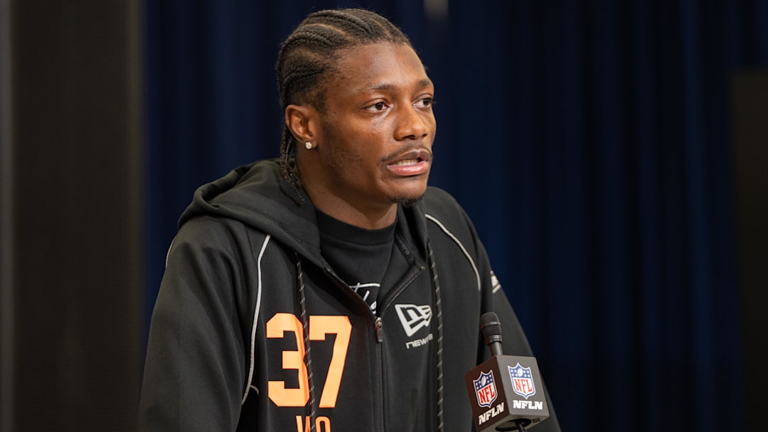 Feb 27, 2026; Indianapolis, IN, USA; Ohio State wideout Carnell Tate (WO37) speaks to members of the media during the NFL Combine at the Indiana Convention Center.  