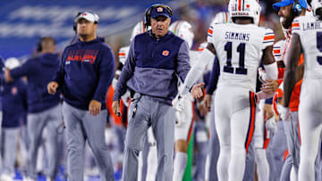 Oct 26, 2024; Lexington, Kentucky, USA; Auburn Tigers head coach Hugh Freeze fives Auburn Tigers wide receiver Malcolm Simmons (11) during the second quarter against the Kentucky Wildcats at Kroger Field. Mandatory Credit: Jordan Prather-Imagn Images