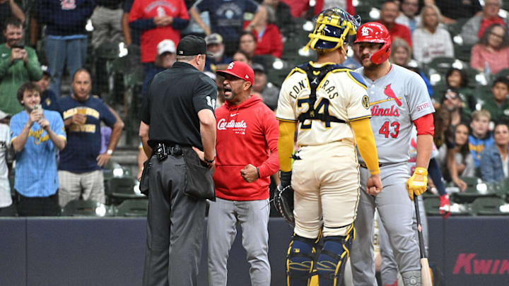 Sep 3, 2024; Milwaukee, Wisconsin, USA; St. Louis Cardinals manager Oliver Marmol (37) argues with umpire Lance Barrett (16) in the fourth inning against the Milwaukee Brewers at American Family Field. St. Louis Cardinals manager Oliver Marmol (37) was ejected. Mandatory Credit: Michael McLoone-Imagn Images