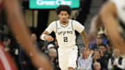 Oct 30, 2025; San Antonio, Texas, USA; San Antonio Spurs guard Dylan Harper (2) gets back on defense during the first half against the Miami Heat at Frost Bank Center. Mandatory Credit: Scott Wachter-Imagn Images