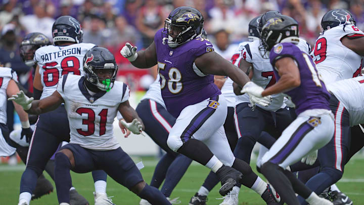 Sep 10, 2023; Baltimore, Maryland, USA; Baltimore Ravens tackle Michael Pierce (58) applies pressure against the Houston Texans at M&T Bank Stadium. Mandatory Credit: Mitch Stringer-Imagn Images