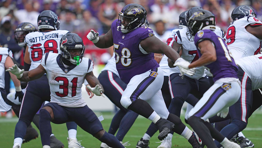 Sep 10, 2023; Baltimore, Maryland, USA; Baltimore Ravens defensive tackle Michael Pierce (58) applies pressure against the Houston Texans at M&T Bank Stadium. Mandatory Credit: Mitch Stringer-Imagn Images