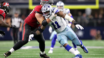Dec 22, 2024; Arlington, Texas, USA; Dallas Cowboys linebacker Micah Parsons (11) rushes the passer against Tampa Bay Buccaneers offensive tackle Luke Goedeke (67) in the fourth quarter at AT&T Stadium. Mandatory Credit: Tim Heitman-Imagn Images