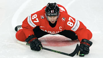 Sidney Crosby chatter has gone into high gear following an AI-altered photo depicting the Penguins captain in a Maple Leafs jersey.