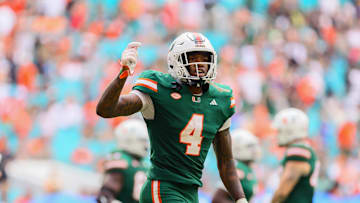Nov 2, 2024; Miami Gardens, Florida, USA; Miami Hurricanes running back Mark Fletcher Jr. (4) celebrates after scoring a touchdown against the Duke Blue Devils during the fourth quarter at Hard Rock Stadium. Mandatory Credit: Sam Navarro-Imagn Images