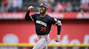Sep 25, 2025; Arlington, Texas, USA; Minnesota Twins center fielder Byron Buxton (25) celebrates as he rounds the bases after hitting a three run home run against the Texas Rangers during the eighth inning at Globe Life Field. Mandatory Credit: Jerome Miron-Imagn Images