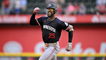 Sep 25, 2025; Arlington, Texas, USA; Minnesota Twins center fielder Byron Buxton (25) celebrates as he rounds the bases after hitting a three run home run against the Texas Rangers during the eighth inning at Globe Life Field.